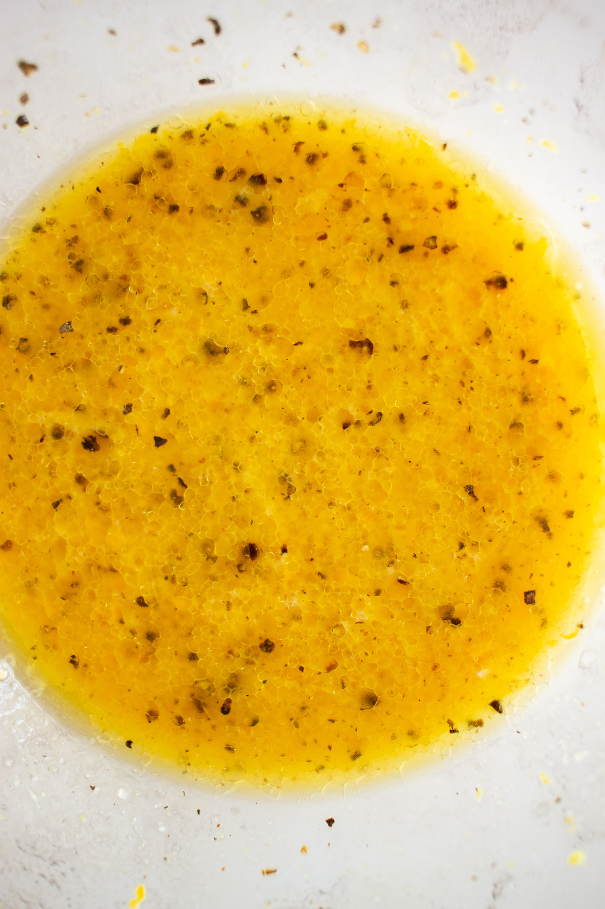 Combined sardine salad dressing in a bowl.